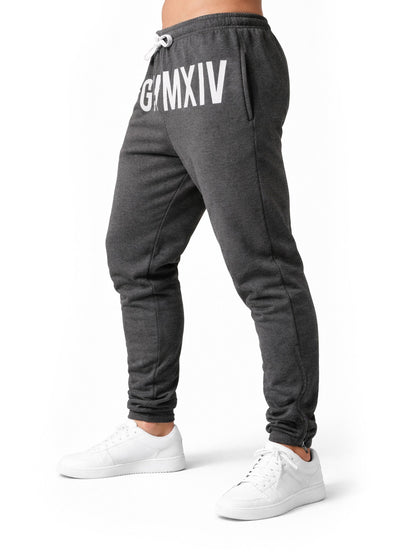 Seitliche Studioansicht der dunkelgrauen Sporthose mit Kordelzug