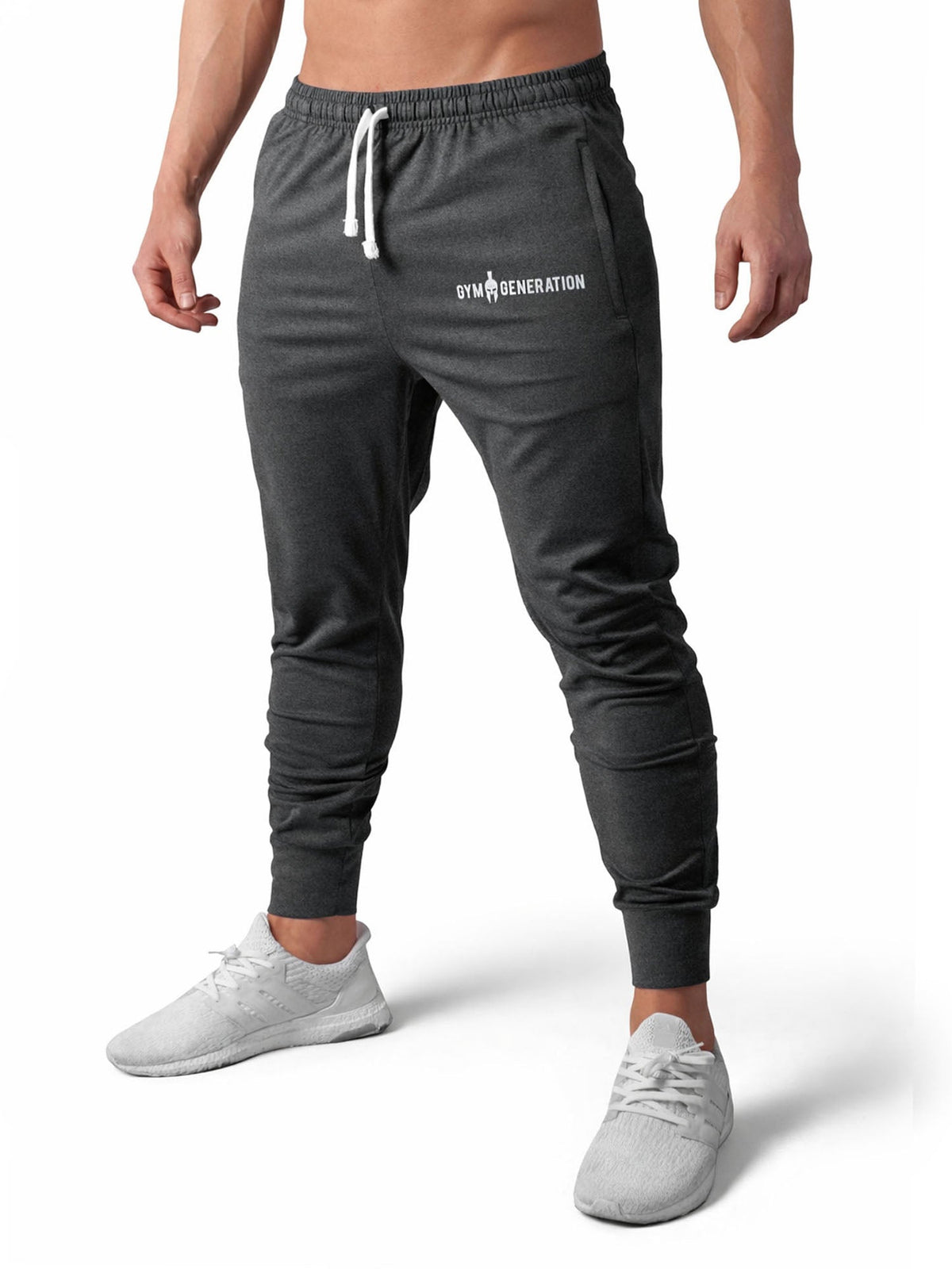 Gym-Sporthose für Herren in Dunkelgrau, seitlich mit schmal zulaufendem Bein