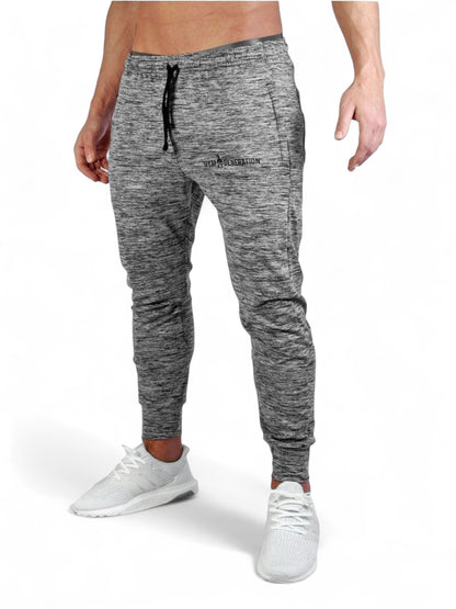 Graue Stretch-Sporthose in der Seitenansicht