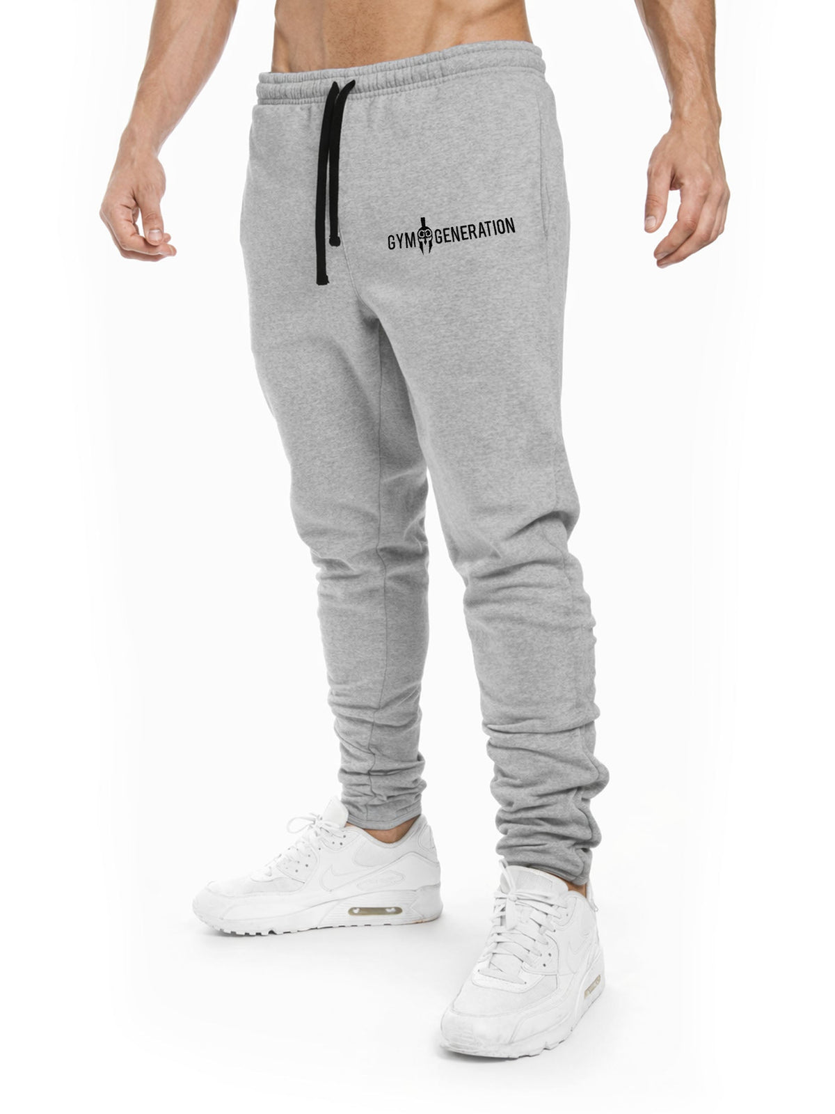 Graue Gym Hose in der Seitenansicht mit schmal zulaufendem Bein