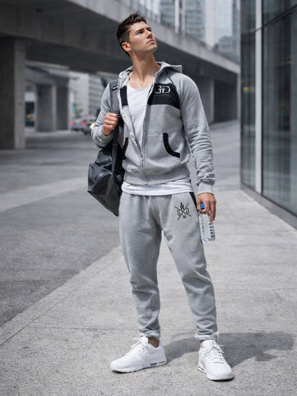 Graue Sporthose kombiniert mit Zip-Hoodie im Streetstyle