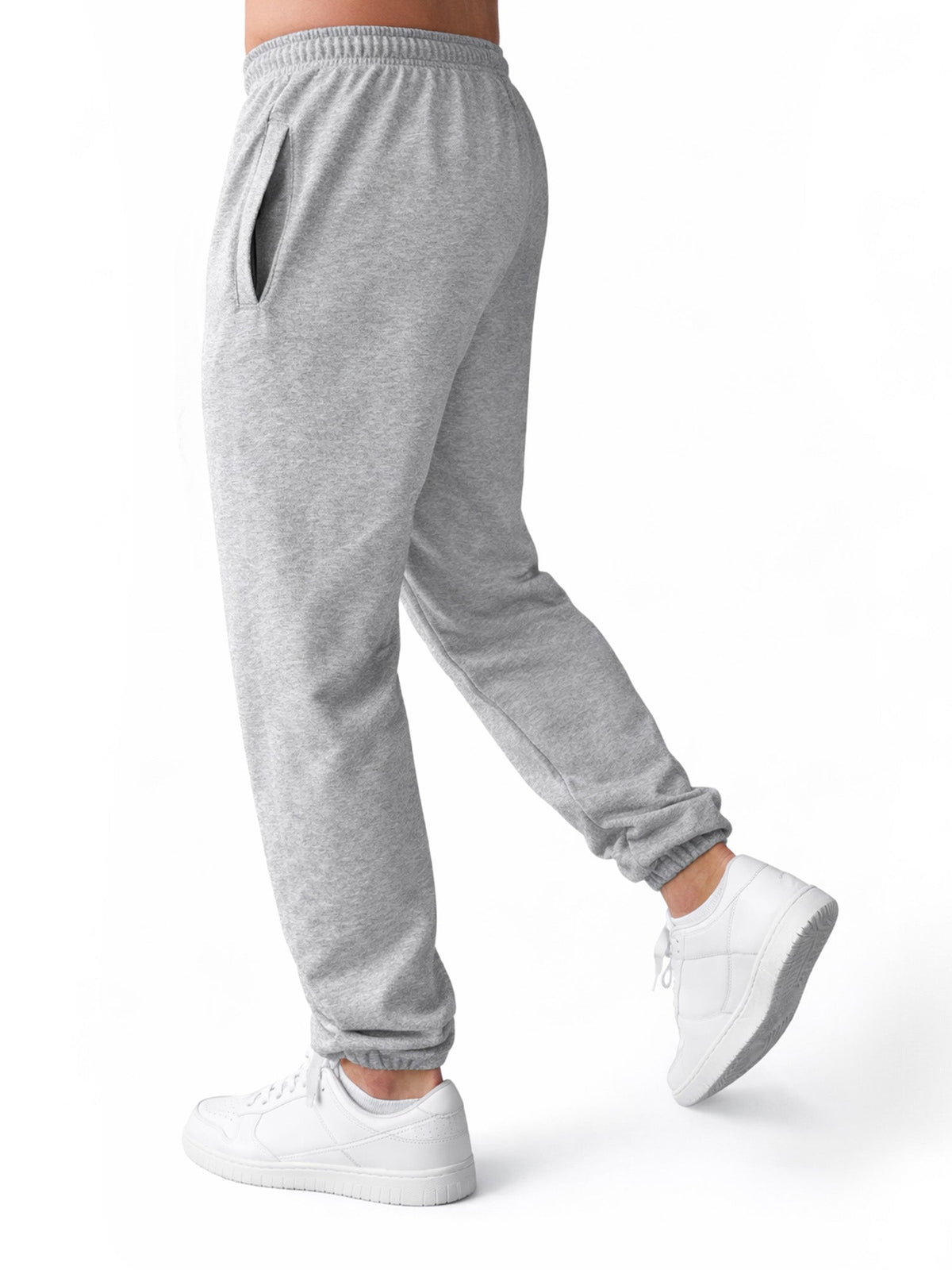 Seitentasche der grauen Hose im Detail, Hand greift hinein