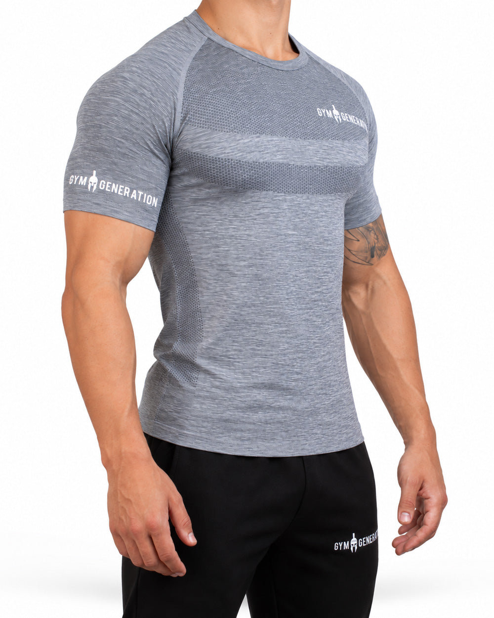 Graues Seamless Sportshirt für Herren von der Seite, mit Raglanärmel und Wabenstreifen an der Flanke